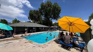 View of swimming pool featuring a patio area