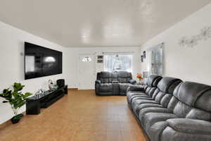 Living room featuring baseboards