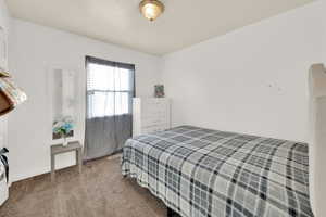 Bedroom featuring carpet floors