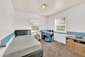 View of carpeted bedroom