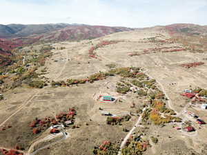 Drone / aerial view featuring a mountain view