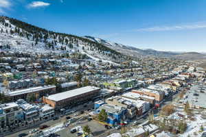 Snowy aerial view with a mountain view