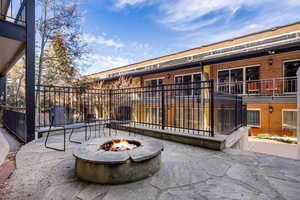 View of patio / terrace with an outdoor fire pit