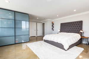 Bedroom with ornamental molding