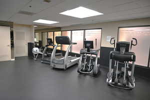 Gym featuring a paneled ceiling