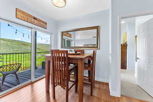 Dining room with light hardwood / wood-style floors