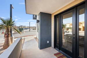 Property entrance featuring a balcony