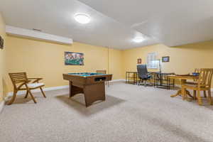 Rec room featuring carpet and billiards