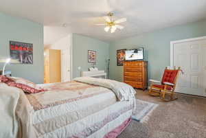 Bedroom with carpet floors and ceiling fan