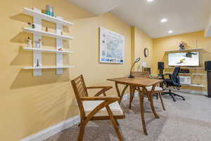 View of carpeted home office