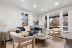 Living room with light hardwood / wood-style flooring