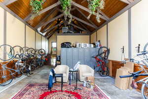 Garage featuring wood ceiling