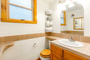 Bathroom with vanity and toilet