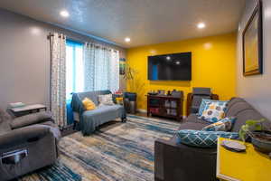 Living room with a textured ceiling