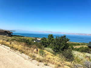 Property view of water with a mountain view