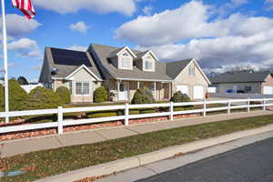 Cape cod home with solar panels