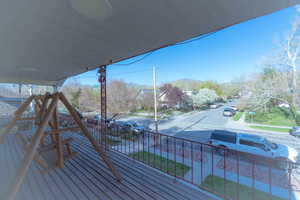 Wooden deck featuring a mountain view