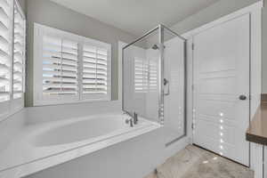 Bathroom with plus walk in shower