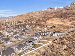 Birds eye view of property with a mountain view