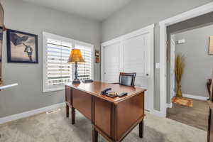 Office area featuring light hardwood / wood-style floors