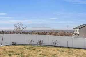 View of yard with a mountain view