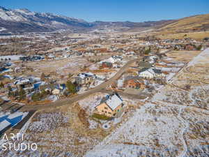 Snowy aerial view with a mountain view