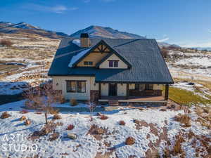 View of front of house with a mountain view