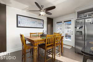 Dining room featuring ceiling fan