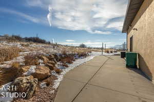 View of patio with a mountain view