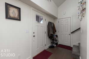 Entrance foyer with vaulted ceiling