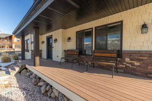 Wooden deck featuring a porch