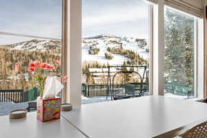 Doorway featuring a mountain view