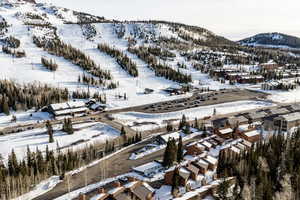 Snowy aerial view with a mountain view