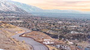 Aerial view at dusk featuring a mountain view