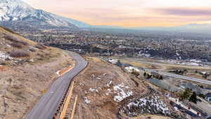 Aerial view at dusk featuring a mountain view