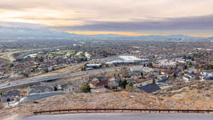 Aerial view at dusk featuring a mountain view