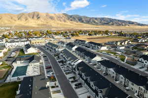 Birds eye view of property with a mountain view