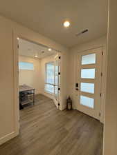 Entryway featuring dark hardwood / wood-style floors