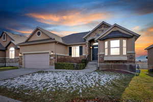 View of front of property with a garage