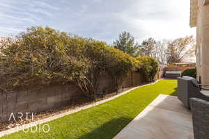 View of yard with a patio area