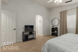 Bedroom featuring ceiling fan and light carpet