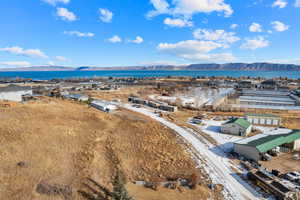 Birds eye view of property with a mountain view