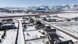 Snowy aerial view with a mountain view