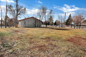 View of yard with a trampoline