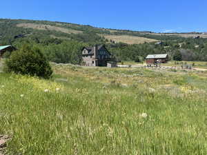 Property view of mountains with a rural view