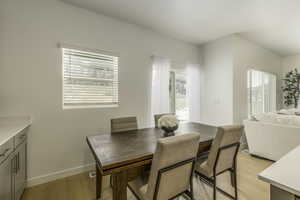 Dining space featuring light hardwood / wood-style flooring