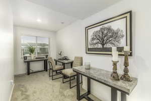 Office area with light colored carpet