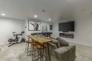 Interior space featuring light colored carpet