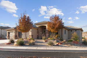 View of front of property featuring a garage