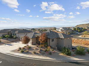 Birds eye view of property with a mountain view